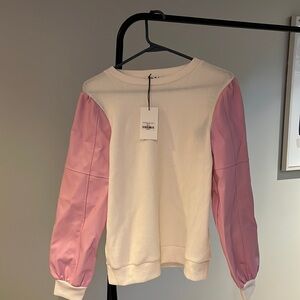 THML shirt from winter 2024. Faux light pink leather sleeves. NWT